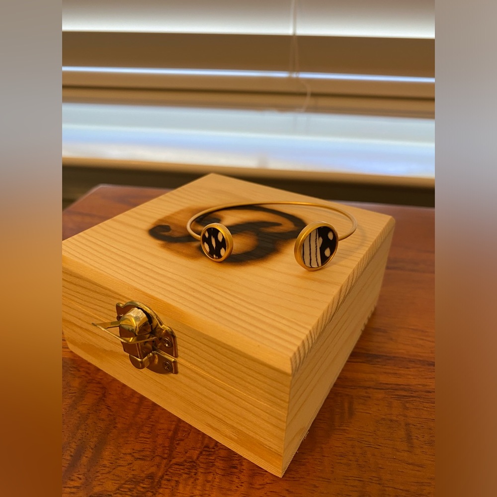Elegant Gold and Black Bracelet